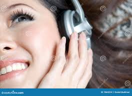 Beautiful Girl Enjoying Music Close Up Stock Photo