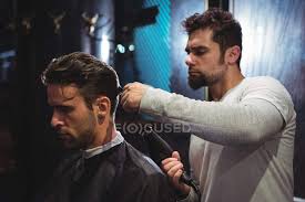 As the sleeker version of the quiff, the pompadour has continued to be a popular men's fashion decision. Barber Blow Drying Client Hair In Barber Shop Style Men Stock Photo 225289106