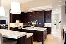 Spectacular Kitchen Design With Tall Tray Ceiling And Wall To Wall Espresso Raised Panel Cabinets Wi Home Decor Kitchen Home Kitchens Espresso Kitchen Cabinets