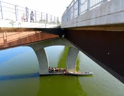 Pedestrians, bikes, scooters, and pedicabs on the pfluger pedestrian bridge in austin, texas in. Pfluger Pedestrian Bridge Austin Mapio Net