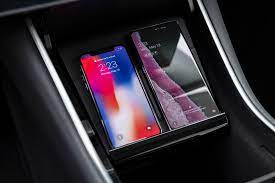 You can also unlock it from inside the car from the screen. Tesla S Us Made Model 3 Now Has Standard Wireless Phone Charging Tesla Hasn T Changed Many Visible Features On The Model Phone Charging Tesla Wireless Charger