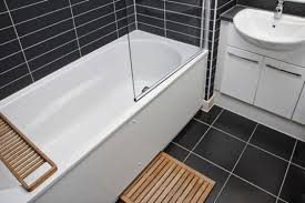 This wooden beam ceiling and wooden floor evoke a warm spirit into the room. 8 Ways To Make Your Bathroom More Eco Friendly
