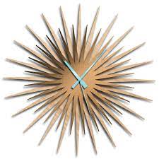 Find furniture & decor you love at hayneedle, where you can buy online while you explore our room designs and curated looks for tips, ideas & inspiration to help you along the way. Metal Art Studio Atomic Era Clock Maple Bronze Blue By Adam Schwoeppe Mid Century Modern Clock On Brushed Maple Polymetal As0792bl