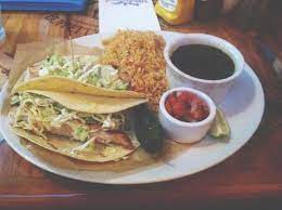 I added some chopped sweet onion chopped fresno chile and sweet red pepper to the slaw for more veggies and crunch. Grilled Mahi Mahi Fish Taco Picture Of Margaritaville Nashville Tripadvisor