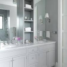 Although you can opt for a white countertop that perfectly matches your cabinets, light gray countertops will offer just a little bit of separation. Grey Bathroom Cabinets Design Ideas