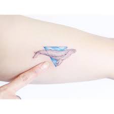 A creative process in which you're always involved. Lighthearted Delicately Designed Tattoos That Are Inked With A Rainbow Of Candy Colored Pastels