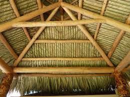 What i really like about old palm thatch roofs is that they make wonderful palm thatch mulch. Thatched Roof Made From Real Palm Fronds Florida Palmtrees Tiki Hut Bamboo House Design Backyard Pavilion