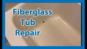 Mix up some fiberglass resin and its hardener as directed on the packaging, then pour it onto the fiberglass cloth and gently spread it. Repairing A Fiberglass Tub Youtube
