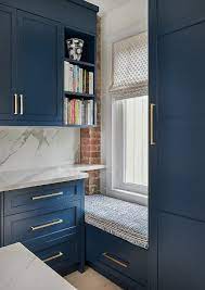 The counter space holds a microwave, cooking utensils and leaves more counter space than i had the storage capacity is amazing! Blue Built In Window Seat In Blue Kitchen Transitional Kitchen