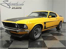 Black And Yellow Mustang 1969 Ford Boss 302 Mustang Yellow With Black Stripes Ford Mustang Boss Mustang Boss Ford Mustang Car