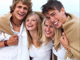 Group Of Young People Having Fun At The Beach People Having Fun Public Relations Orthodontics
