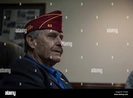 Charles Schmidt, American Legion National Commander, presents Brig. Gen Barry  Cornish, 18th Wing commander, with an American Legion pen Nov. 28, 2016, at  Kadena Air Base, Japan. The American Legion presents multiple