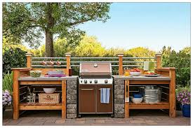 If you plan on doing a lot of grilling and entertaining, be sure to have a workspace set up next to your grill. Backyard Grill Station Ideas Novocom Top