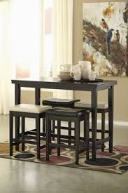 Kimenta Dark Brown Wood Dining Room Counter Table Two Ivory Two Dark Brown Upholstered Barstools Counter Height Table Sets Counter Height Dining Table Wood Dining Room