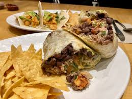 I come here on tuesdays for the fish taco deal but this time someone gave me a coupon for a free meal up to 10 dollars worth so i got the shrimp burrito meal that came with chips. Eating Orlando An Orlando Food Blog Let Me At That Lobster Burrito At Rubio S