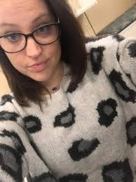 Teddy bear sweatshirt and plaid vest outfit