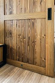 What is a solid interior door? Sliding Doors In Small Apartment White Wood And Black Accessories