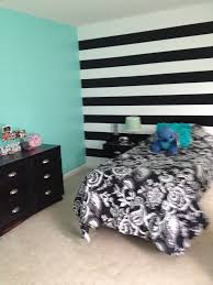 Turquoise On Three Walls Black And White Horizontal Stripe On One Accented With Black White Striped Walls Bedroom Black White And Gold Bedroom Striped Room
