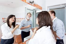 I invited the young man canvassing for charity in. Beautiful Young Couple In The Bathroom Getting Ready For Work Stock Photo Picture And Royalty Free Image Image 31664637
