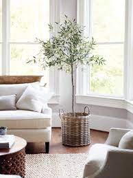 Check spelling or type a new query. Indoor Olive Tree With Wicker Basket In Neutral Living Room On Thou Swell Thouswellblog Farm House Living Room Natural Home Decor Home Decor