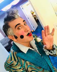 Caesar's stylish appearance and suit