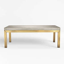 You need a place to put up your feet, put down drinks, and most importantly, to anchor the room. Brass Coffee Tables Crate And Barrel