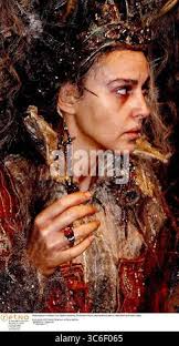 Monica Bellucci in director Terry Gilliam's upcoming The Brothers Grimm,  starring Monica Bellucci, Matt Damon and Heath Ledger. EXCLUSIVE PICTURES  FROM ALL ACTION DIGITAL Stock Photo