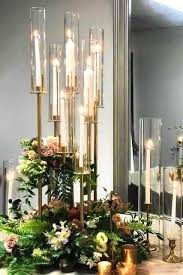 The Aura Candelabra Is A Unique Design That You Won T Find Anywhere Else Holds Florals Tape Candelabra Wedding Wedding Table Centerpieces Candle Centerpieces
