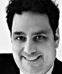 George D. Prayias Promoted At Premiere