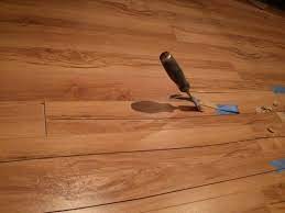 Repairing Water Damaged Laminate Flooring Laminate Flooring Laminate Floor Repair Wood Laminate Flooring