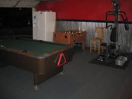 The Man Cave Is Stocked With The Necessities A Vintage 57 Valley Pool Table A Foosball Table Exercise Equ Valley Pool Table No Equipment Workout Pool Table