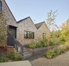 Available For Holiday Lets The House Sits On A Small Promontory In A Secluded Lagoon In The Norfolk Broads And Offers A Contem Architect Architecture Eco House