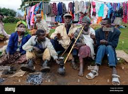Dorze people smoking in a market day. Chencha, Gamo Gofa Zone, Ethiopia  Stock Photo - Alamy