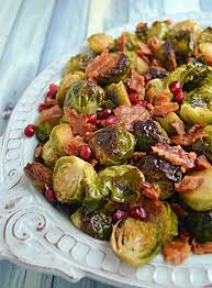 Roasted Honey Balsamic Brussels Sprouts With Bacon And Pomegranate Seeds Host The Toast Recipe Sprout Recipes Honey Balsamic Brussel Sprouts Brussels Sprouts Recipe