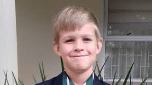 Caleb a champion swimmer