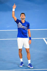 Novak djokovic says he could potentially 'cause more damage' to his body by continuing to compete at the australian open following the abdominal injury after overcoming novak djokovic overcame his fitness doubts to defeat milos raonic at the australian open. Serbian Tennis Player Novak Djokovic In Australia Open 2019 Tennis Court Photo Shoot Tennis Outfit Lacoste For Tennis Clothes Tennis Stars Tennis Players