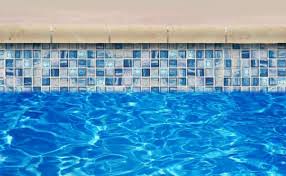 Waterline pool tiles create a smooth surface for dirt, sunscreen and body oil to adhere to. 25 Flooring Patterns For Swimming Pools Rtf Rethinking The Future