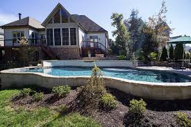 Lovely Pool Built On A Lot With Extreme Yard Slope Backyard Pool Landscaping Pool Houses Pool Landscape Design