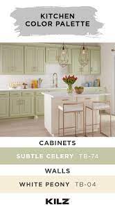 White Marble Countertops Green Painted Cabinets Hanging Pendant Lights A Subway Tile Back White Marble Countertops Kitchen Color Palettes New House Bathroom