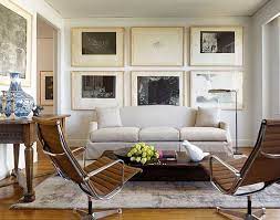 Another idea would be to choose a combination of arts to be hung on the living room walls. How To Choose Art For Your Living Room Living Room Inspiration Family Living Rooms Interior Design