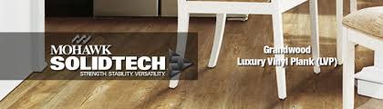 The newest and best hard surface flooring. Grandwood Plank Mohawk Solidtech Luxury Vinyl Flooring Mohawk Lvt Luxury Vinyl Floor