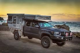 Adventure truck 2.0 is crowned with a homemade, expandable truck bed topper that fits a tiny kitchen and two beds. Four Wheel Campers Main Line Overland