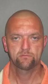 Dayton man charged with theft, aggravated assault after police chase