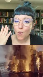 Panning down shot from Lady Liberty's torch to the guys below