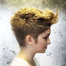 From the style and color of those baby emo bangs to the long sides and that bitchin' crossbones, this is one of our favorite short punk hairstyles. 35 Short Punk Hairstyles To Rock Your Fantasy
