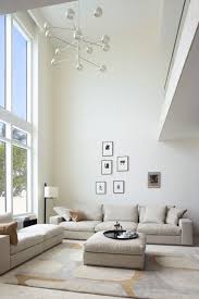Living Room Modern High Ceiling Living Room With Nice Designs Adorable Living Room High Ceil High Ceiling Living Room Home Interior Design Living Room Lighting