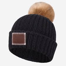 This Cuffed Pom Beanie Is Knit In A Black Yarn Color And Features A Red Maple Leather Patch Debossed With The Love Your Melo Love Your Melon Pom Beanie Pom Pom