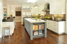 Now, if you have small cabinets making up the body of your kitchen island, make sure that they are always clean, especially if they have fine carvings on them. Gray Center Island With Cookbook Shelves Transitional Kitchen Kitchen Bookshelf Kitchen Island Design Kitchen Plans