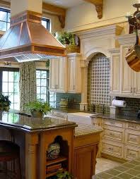 Beautiful cream colored cabinetry and chocolate wood stained island. Uba Tuba Granite Counter Tops Tips For Including The In Your Kitchen