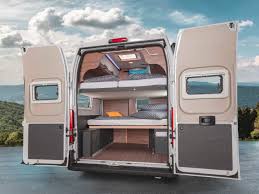 The happijac® power bed lift is easy to operate and perfect to maximize space in toy hauler garages by lifting beds out of the way to make room for motorcycles or atvs. Camper Van Sleeps 7 With Lift Away Beds Curbed